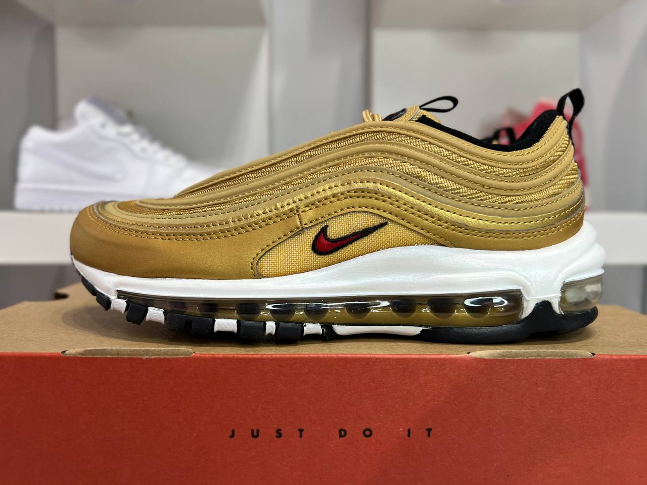 Gold air maxes 97 hotsell